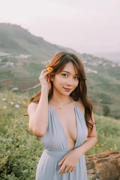 Portrait Asian Happy Young Woman Blue Dress Flower Field Mountains — Stok Foto