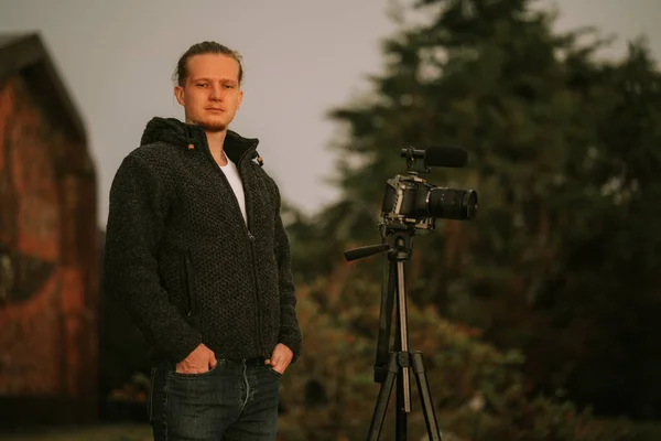 Man videographer making video of sunset at Doi Inthanon National Park Thailand. High quality photo