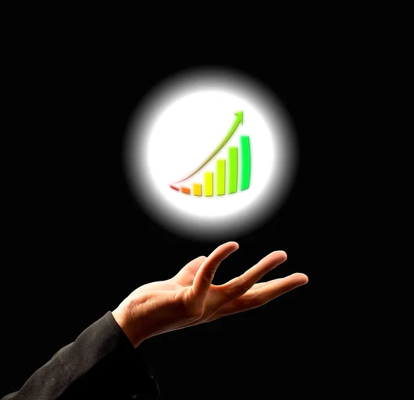 Businessman holding growing graph — Stock Photo, Image