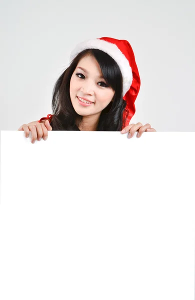 Santa donna in possesso di un poster bianco — Foto Stock