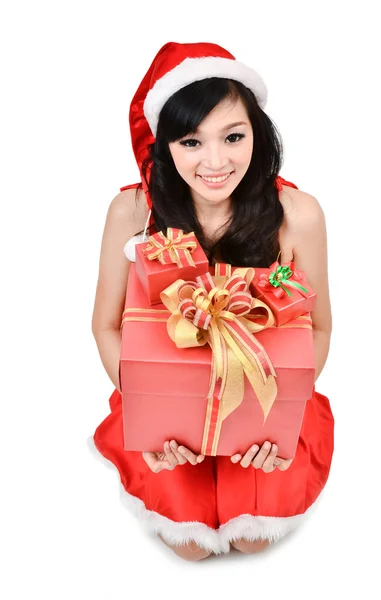 Santa woman holding a gift box — Stock Photo, Image