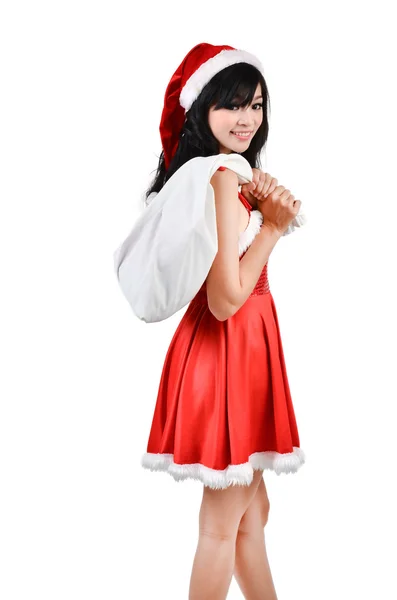 Santa žena držící bílý sáček — Stock fotografie