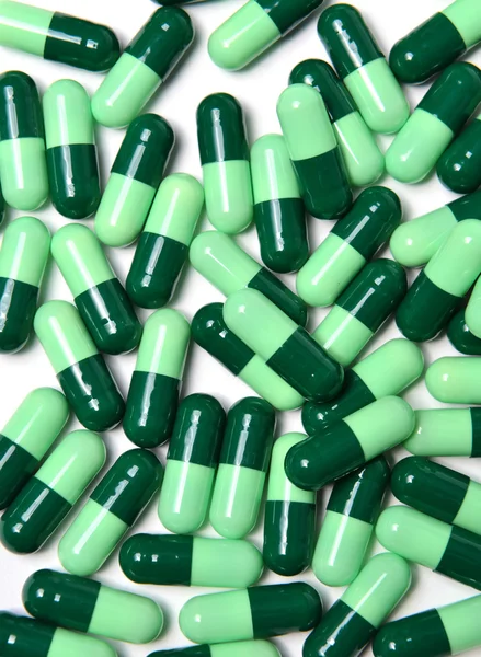 Grupo de medicamento cápsula verde — Fotografia de Stock