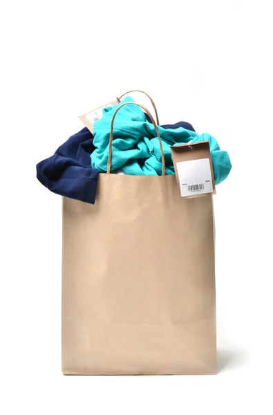 Oblečení v nákupní tašce — Stock fotografie