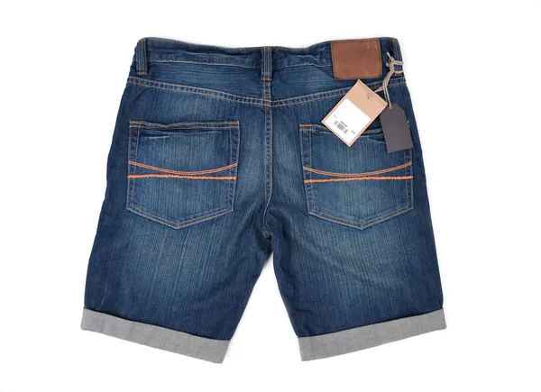 Etiqueta de preço com código de barras em jeans — Fotografia de Stock