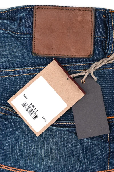 Etiqueta de precio con código de barras en jeans —  Fotos de Stock