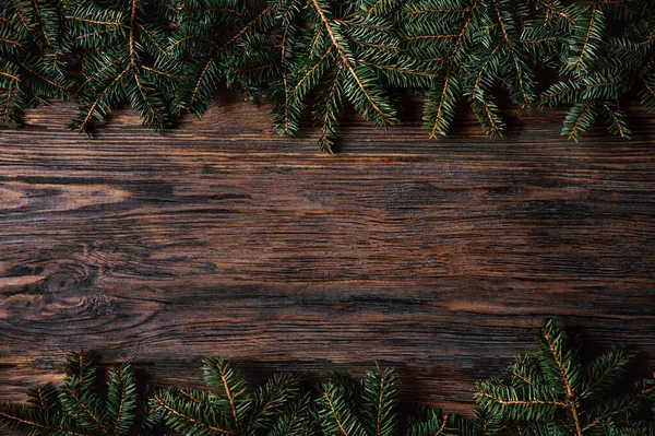 Χριστούγεννα ξύλινο ρουστίκ φόντο με έλατο δέντρο. — Φωτογραφία Αρχείου