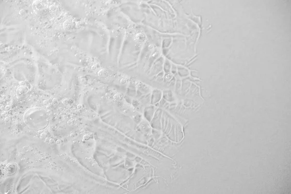 Primer plano macro Aloe vera gel textura cosmética fondo con burbujas. — Foto de Stock