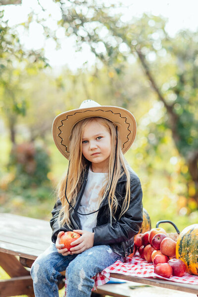 Portrait Girl Eating Red Organic Apple Outdoor Harvest Concept Child Stock Image