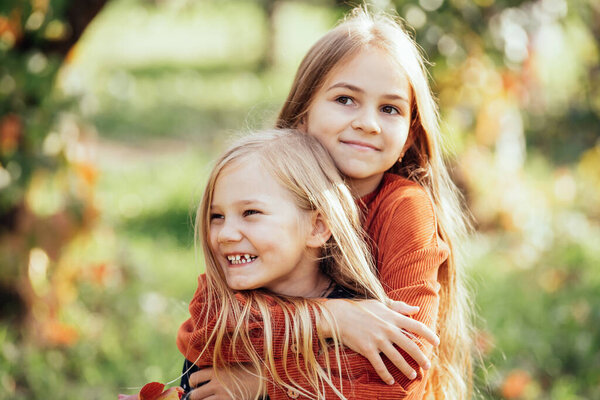 Portrait Two Happy Sisters Laughing Hugging Each Other Warm Sunny Stock Photo