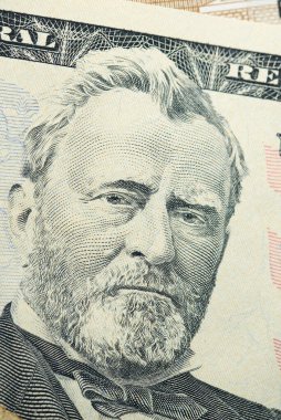 Close up of new fifty dollar bill. Macro close up of Ulysses S. Grant. 50 dollar bill. financial concept. Portrait of U.S. statesman, inventor, and diplomat Ulysses S. Grant