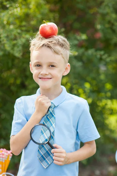 Portrait Schoolboy Looking Magnifying Glass Background Autumn Park Farewell Bell — стоковое фото