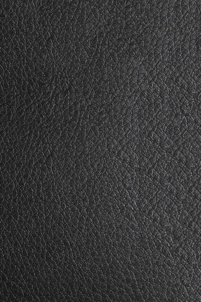 Wrinkled dark plastic texture. Seen from the front