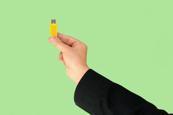 Yellow Usb Memory Stick Hand Green Background Front View — Zdjęcie stockowe