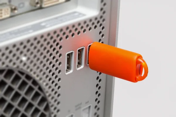 Orange Usb Flash Drive Connecting Desktop Computer Grey Background — Stock fotografie