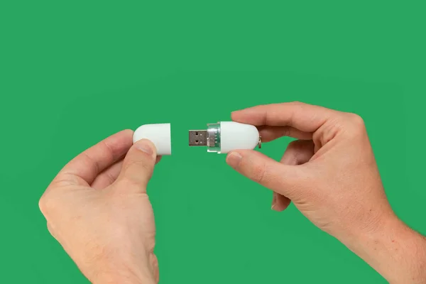 White Usb Flash Memory Hand Isolated Green Background Front View — Stok fotoğraf