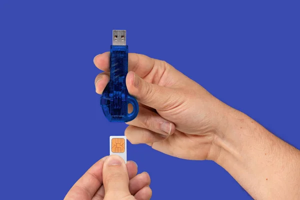 Blue Flash Memory Hand Isolated Blue Background Front View —  Fotos de Stock