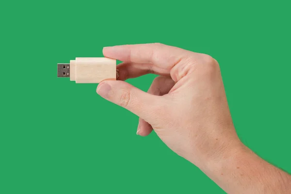 Wood Usb Memory Stick Hand Green Background Front View — Zdjęcie stockowe