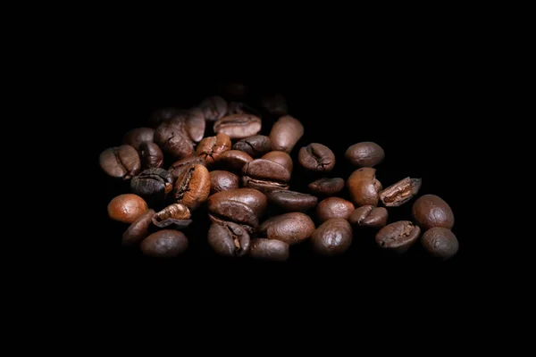 Several Coffee Beans Isolated Black Background Viewed Close — Foto Stock