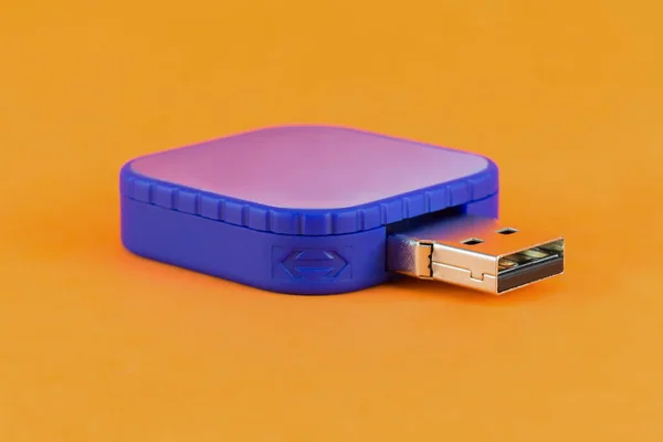 Usb Memory Stick Square Blue Flash Drive Orange Background Viewed — Zdjęcie stockowe