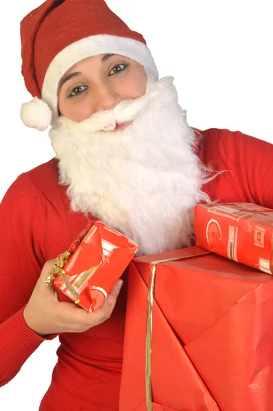 En jultomte distribuerar gåvor — Stockfoto