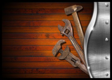 Set of Old Tools on Wood Panel
