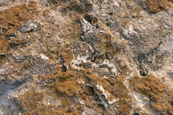 Hintergrund aus braunem Stein — Stockfoto