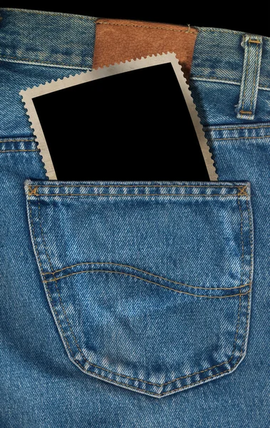 Foto in een zak van blue jeans — Stockfoto