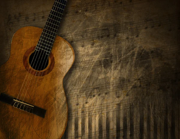 Akustik-Gitarre auf Grunge-Hintergrund — Stockfoto