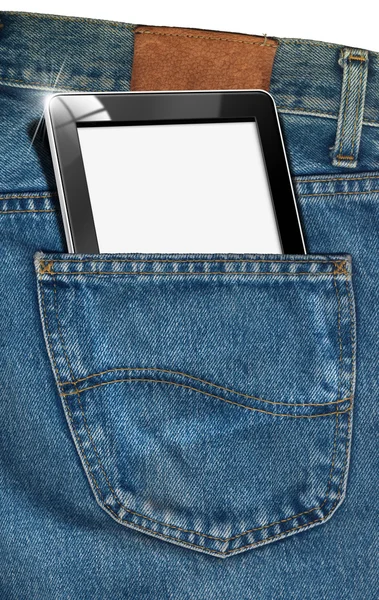 Tablette dans une poche de jeans bleus — Photo