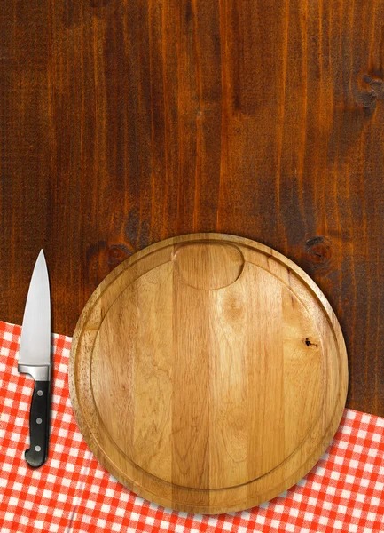 Painel de corte na mesa de madeira — Fotografia de Stock