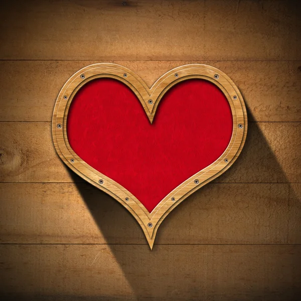 Ξύλινη καρδιά σε τοίχων από ξύλο — Φωτογραφία Αρχείου