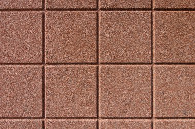 küçük çakıl taşları ile beton yüzey