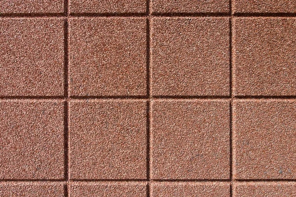 Superfície de concreto com seixos pequenos — Fotografia de Stock