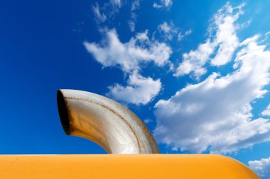 Exhaust Pipe on Blue Sky clipart