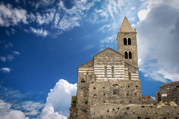 Close-up fo the medieval Church of San Pietro (St. Peter, 1198), headland in Portovenere or Porto Venere village, UNESCO world heritage site. Gulf of La Spezia, Liguria, Italy, southern Europe.