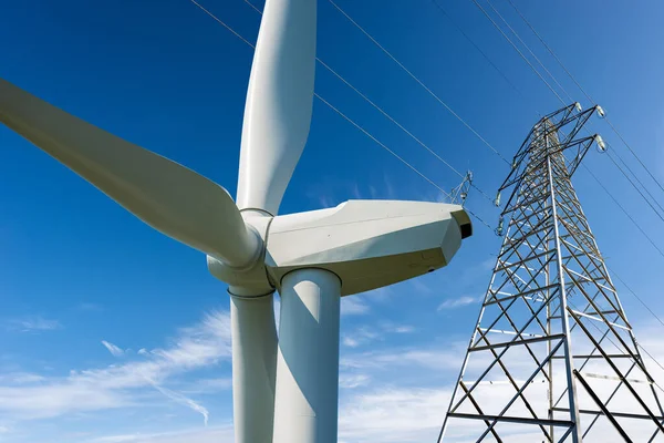 Closeup White Wind Turbine High Voltage Tower Power Line Clear — Stock Photo, Image