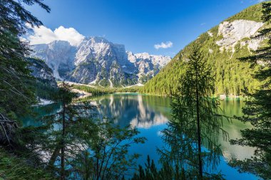 Braies Lake (Lago di Braies or Pragser Wildsee) and the Mountain peak of Croda del Becco or Seekofel, Dolomites, South Tyrol, Trentino Alto Adige, Bolzano province, Italy, Europe. clipart