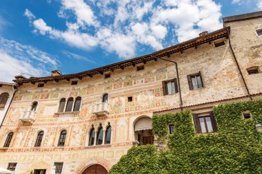 Ancient Spilimbergo castle in Gothic-Renaissance style, medieval origins - XV century, main facade with numerous frescoes. Pordenone province, Friuli-Venezia Giulia, Italy, Europe.