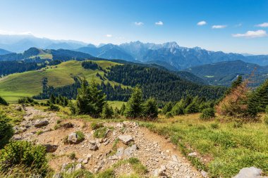 Panoramic view of Carnic and Julian Alps, from the mountain peak of Oisternig or Osternig. Italy-Austria border, Europe. Tarvisio, Udine province, Friuli Venezia Giulia. On background the Slovenia.