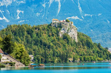 Medieval Bled Castle (Blejski grad), XI century, coast of Lake Bled (Blejsko jezero) on a sunny summer day. Bled town, Gorenjska (Upper Carniola), Triglav National Park, Slovenia, central Europe.