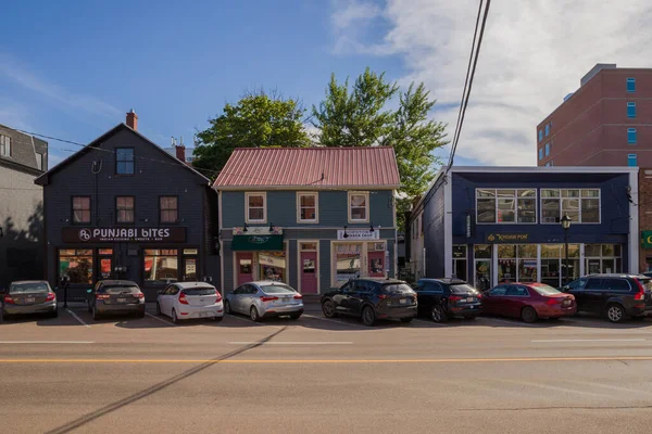 Old style shops outside with parking