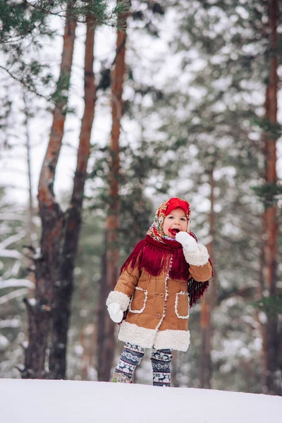 Beautiful Child Girl Walks Lollipop Her Hand Snowy Forest She — стоковое фото
