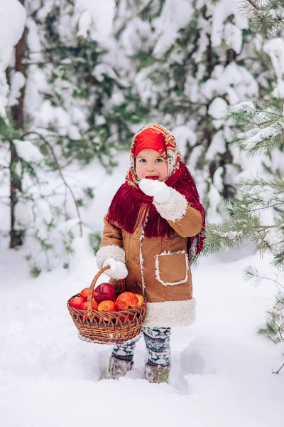 Beautiful Child Girl Walks Lollipop Basket Apples Her Hands Snowy — Fotografia de Stock