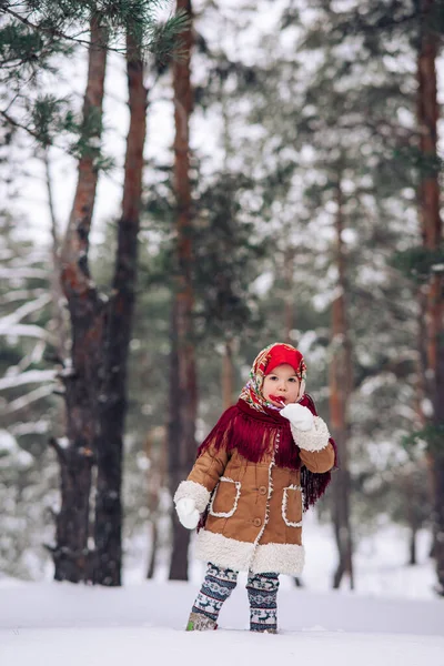 Beautiful Child Girl Walks Lollipop Her Hand Snowy Forest She — стоковое фото