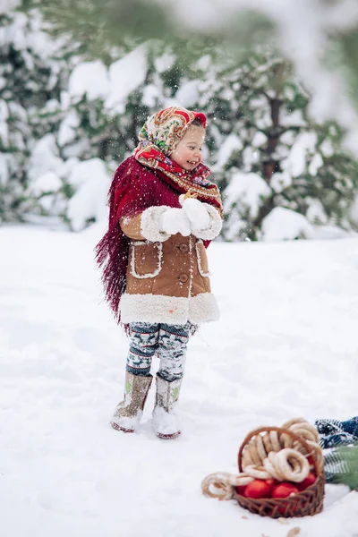 Beautiful Little Child Girl Plays Snowy Forest Basket Apples Bagels — Fotografia de Stock