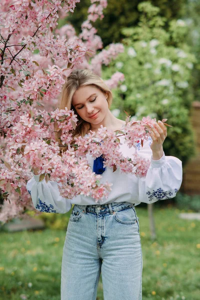 Young Blonde Woman Walks Garden Dressed Ukrainian Embroidered Shirt Enjoys — Stock Fotó