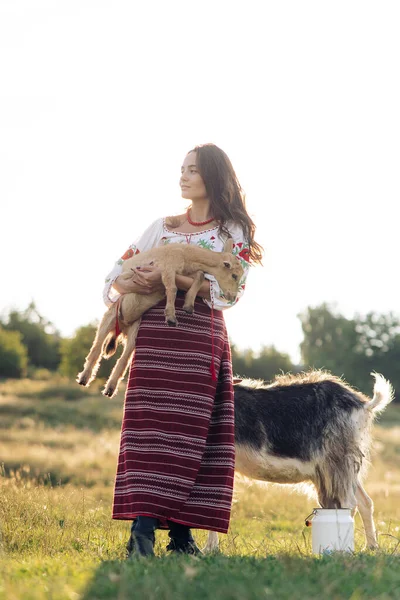 Young Ukrainian Woman Holds Goatling Her Arms Traditional National Embroidered — 스톡 사진