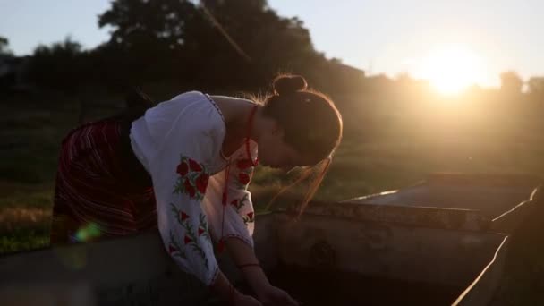 Young Ukrainian Woman Washes Her Face Traditional National Embroidered Shirt — Stock video