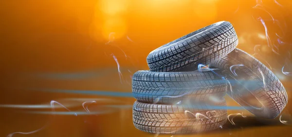 tires in smoke on a colored background
